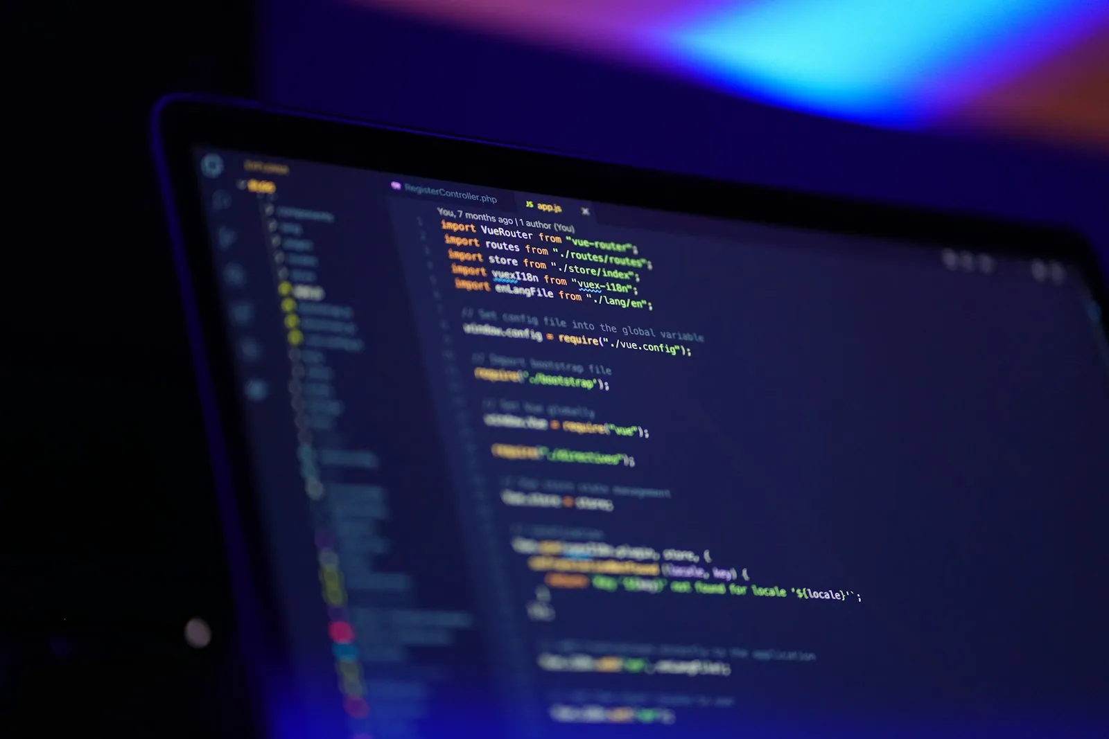 Application source code displayed on a laptop screen