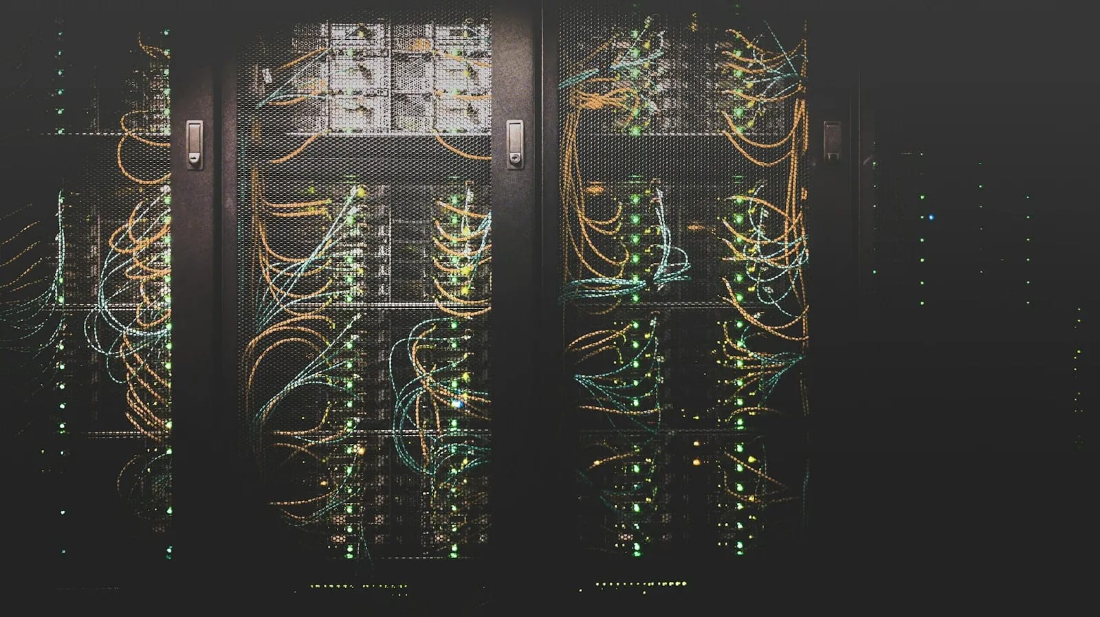 Rows of network infrastructure inside a data centre